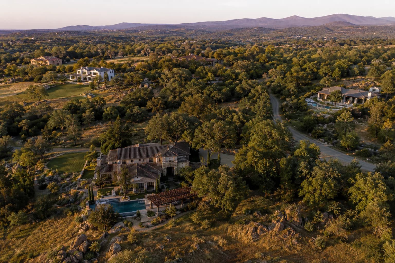Representative low-density Granite Bay estate setting with mature oak woodland