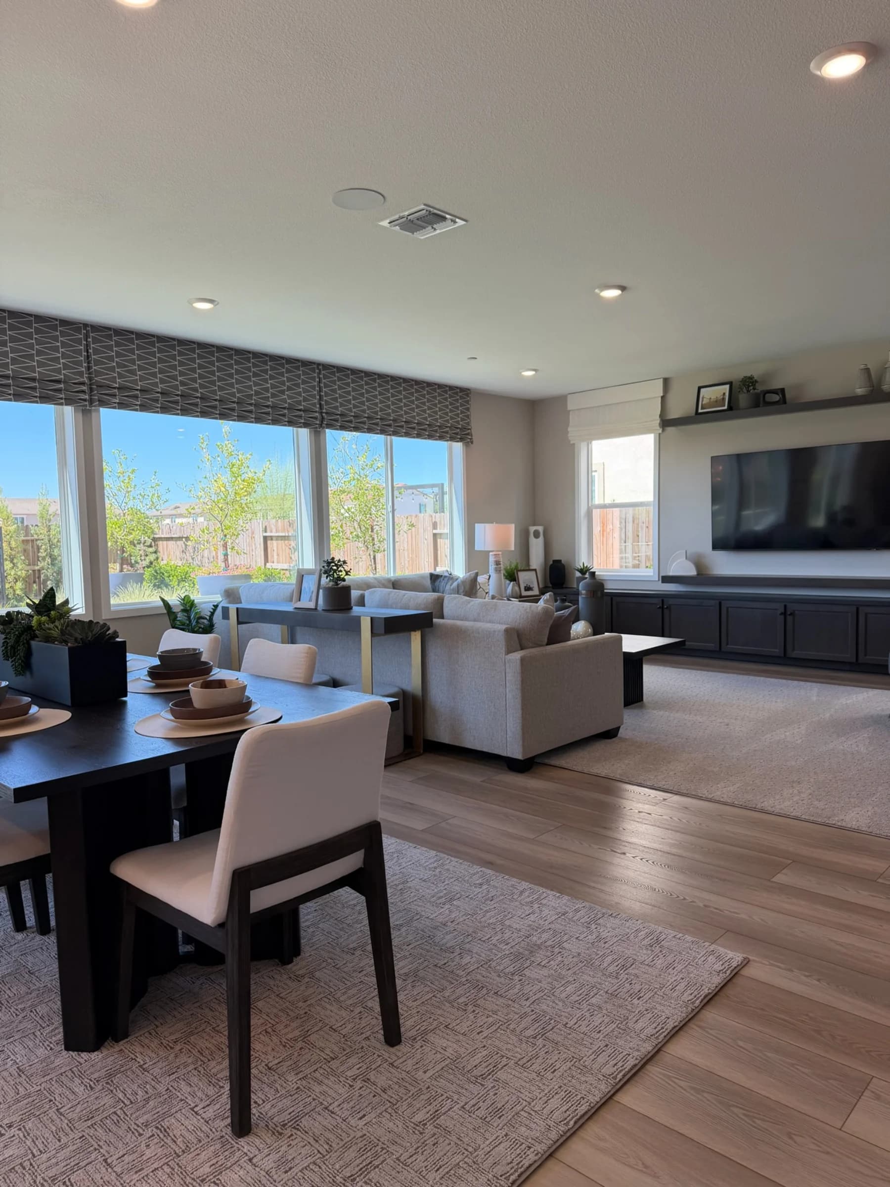 Great room in submitted model-home imagery associated with Bloom at Sunridge Park