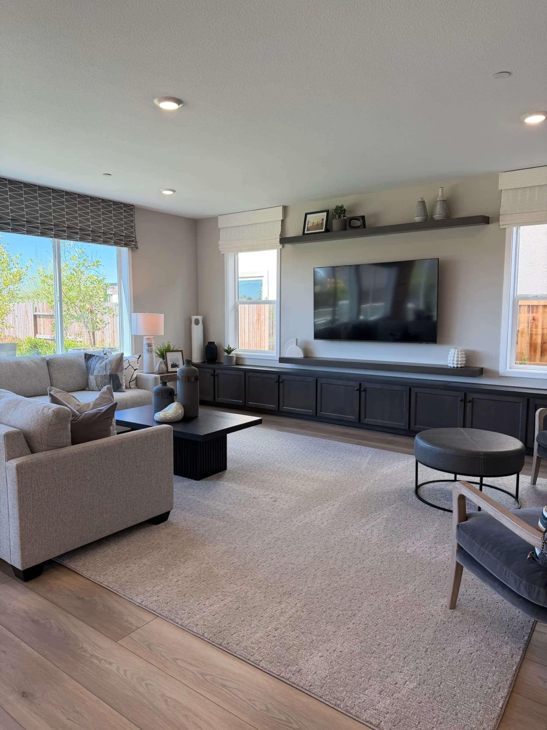 Open-concept living area in submitted model-home imagery associated with Bloom at Sunridge Park