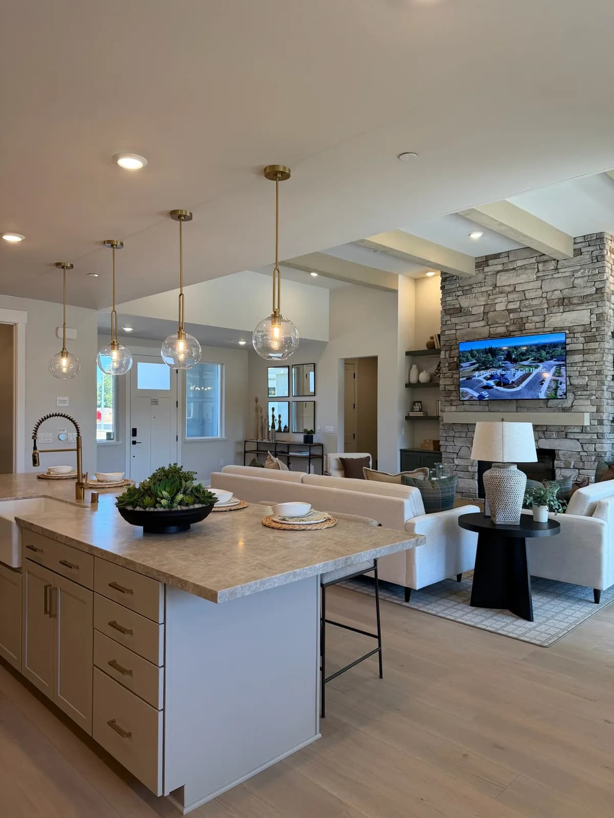 Open-concept living and kitchen area in a Blossom Ridge model home
