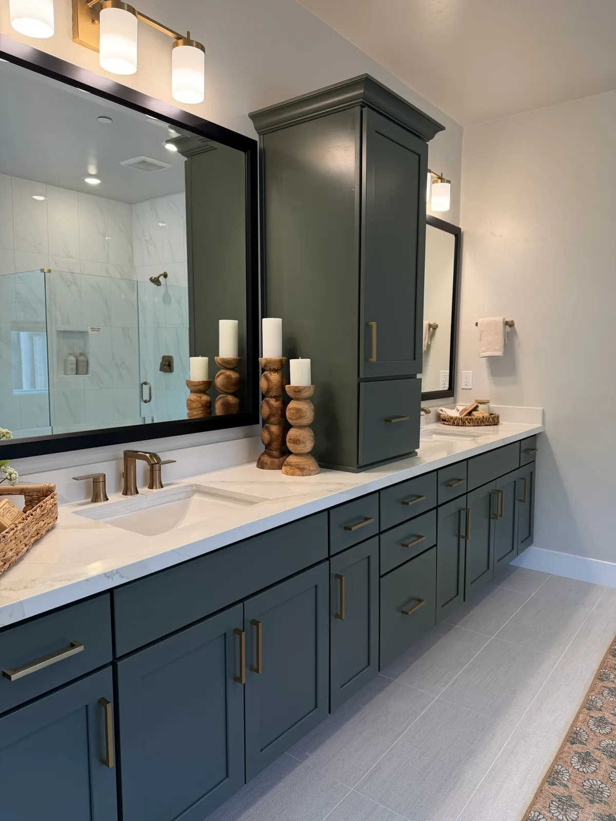 Blossom Ridge model-home primary bathroom with dual vanity and glass shower