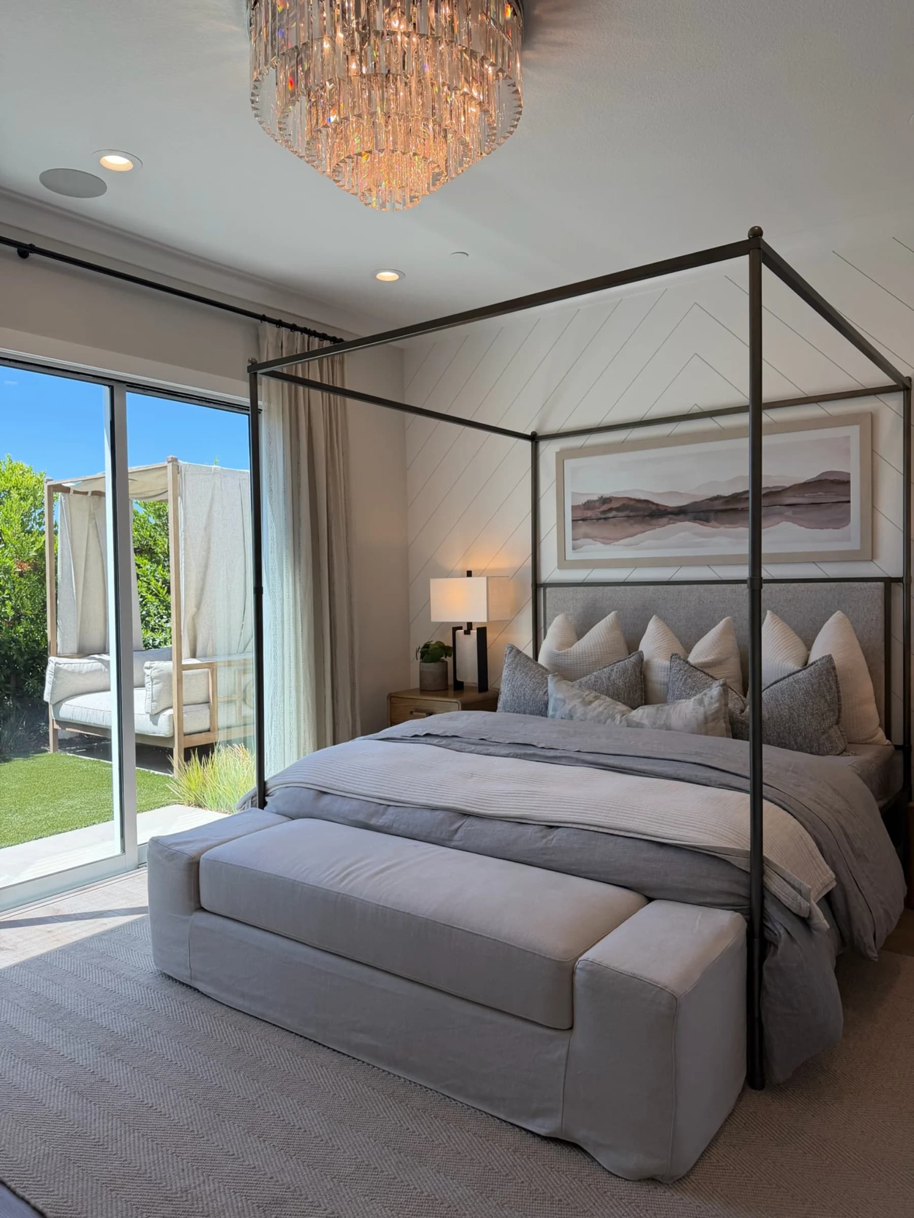 Primary bedroom in submitted model-home imagery associated with Heritage Trails