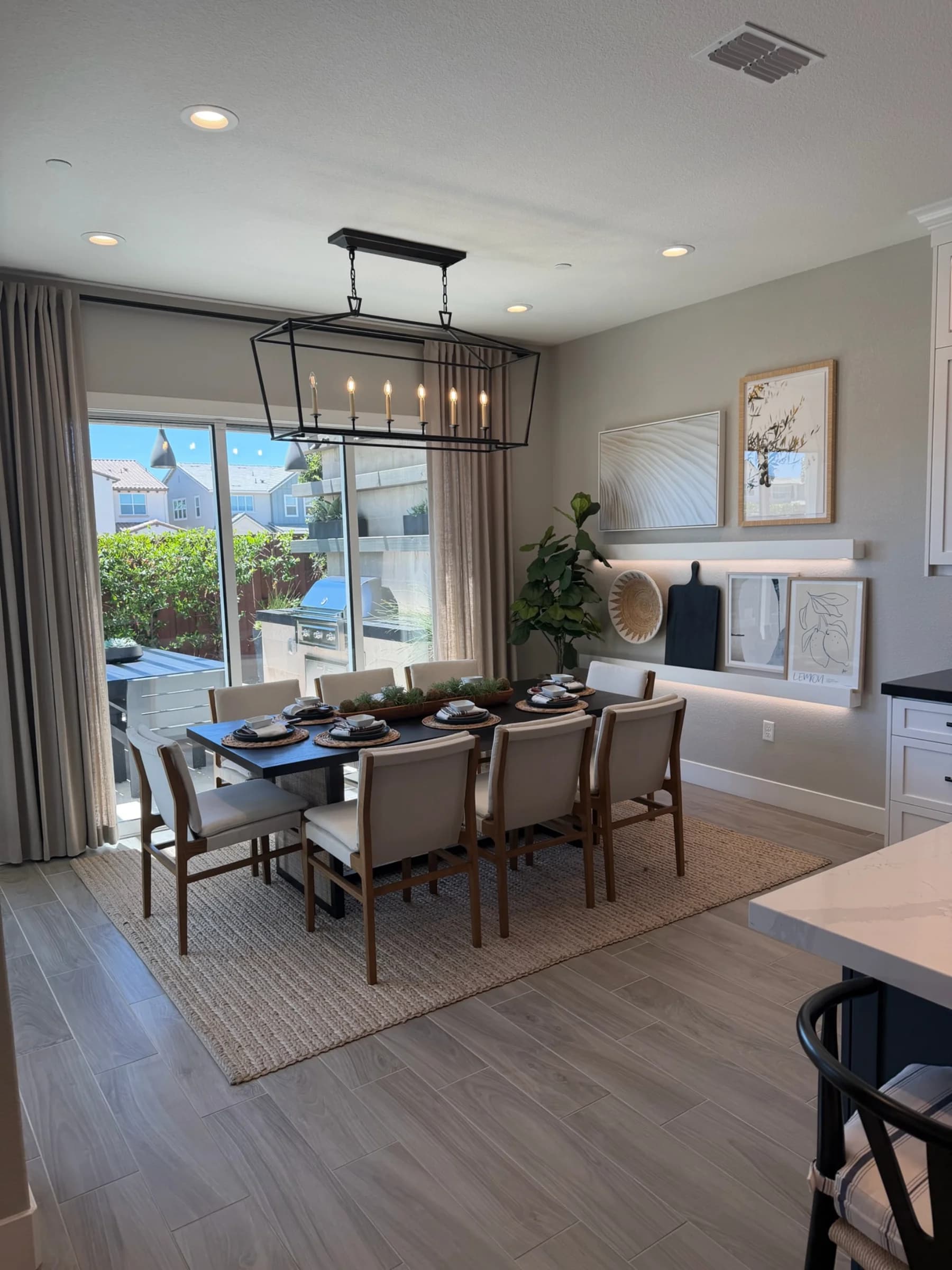 Dining area in submitted model-home imagery associated with Oak Trails