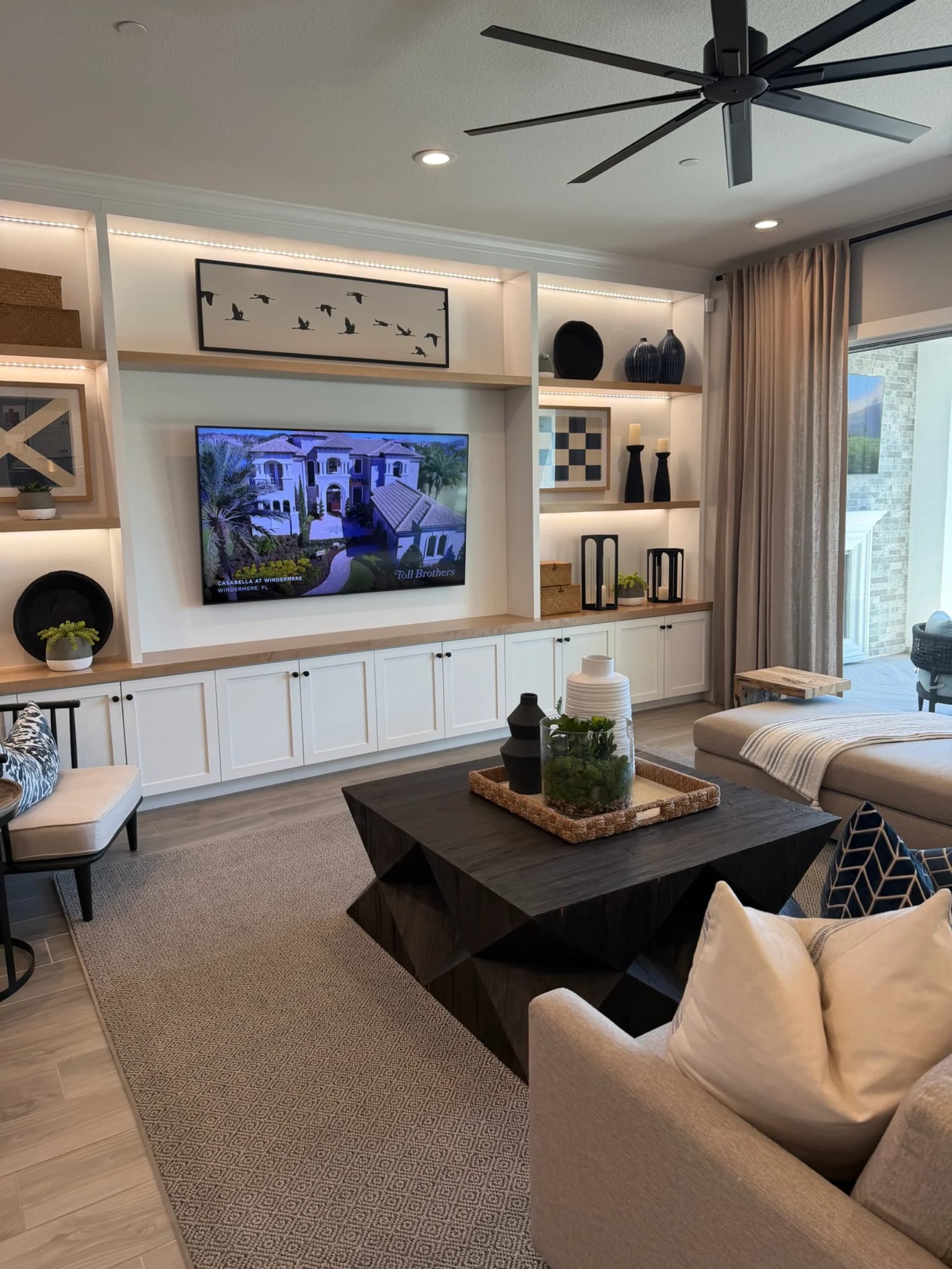 Great room in submitted model-home imagery associated with Oak Trails