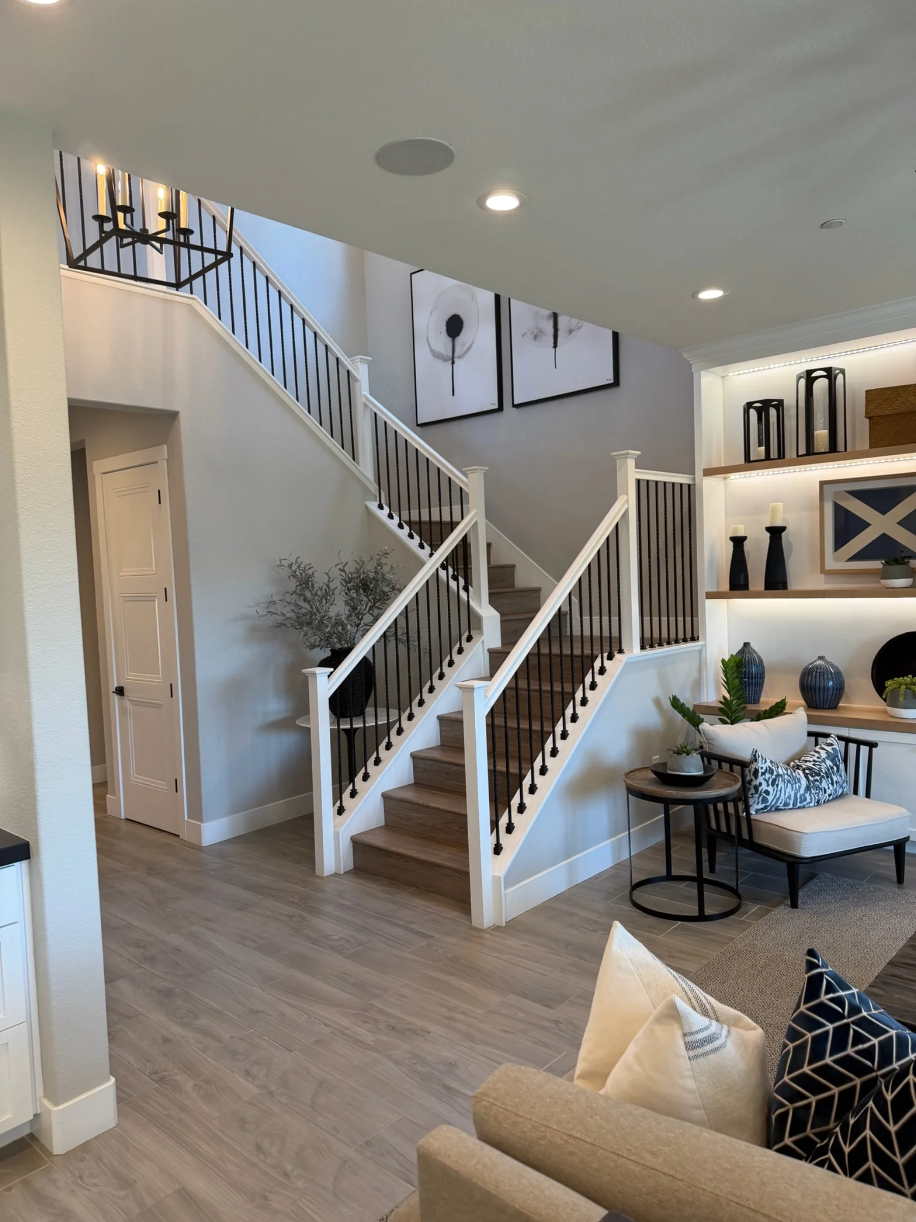 Open-concept living area in submitted model-home imagery associated with Oak Trails