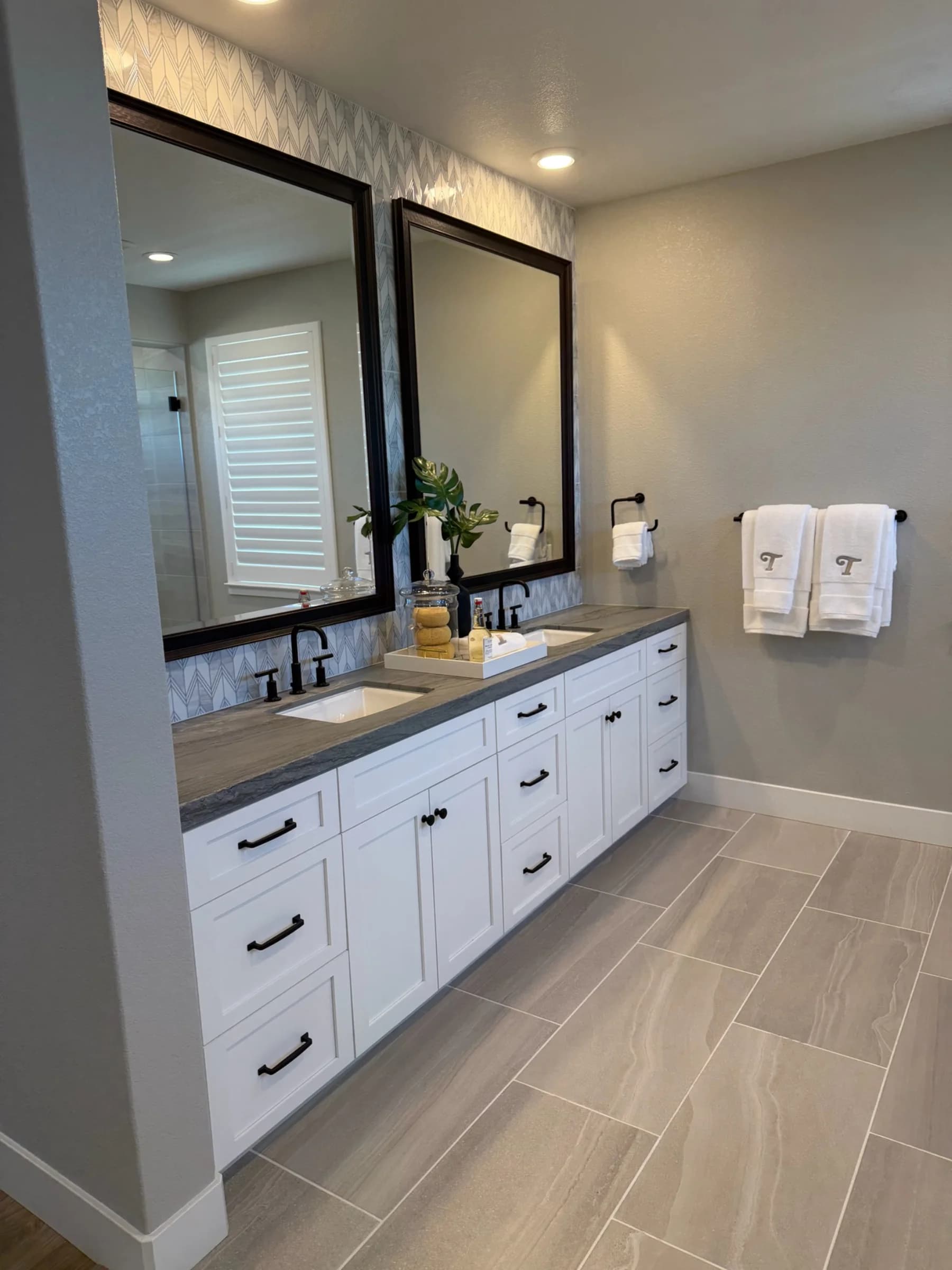 Primary bathroom in submitted model-home imagery associated with Oak Trails