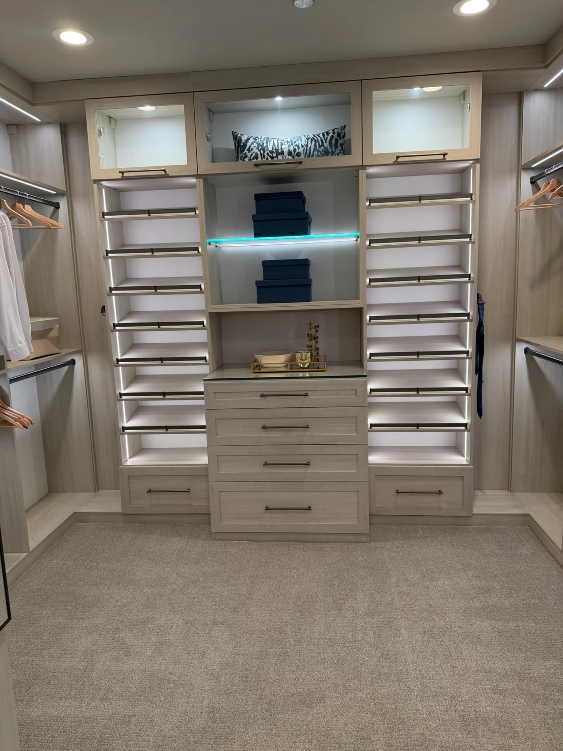 Walk-in closet in submitted model-home imagery associated with Oak Trails