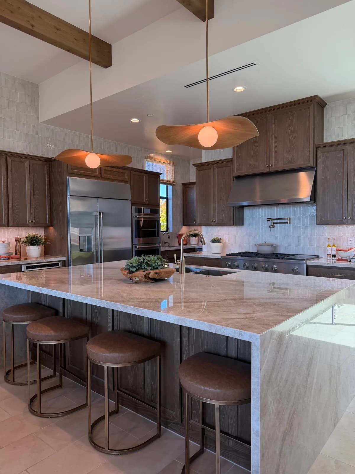 SHAWOOD at Folsom model-home kitchen with a large island and wood cabinetry