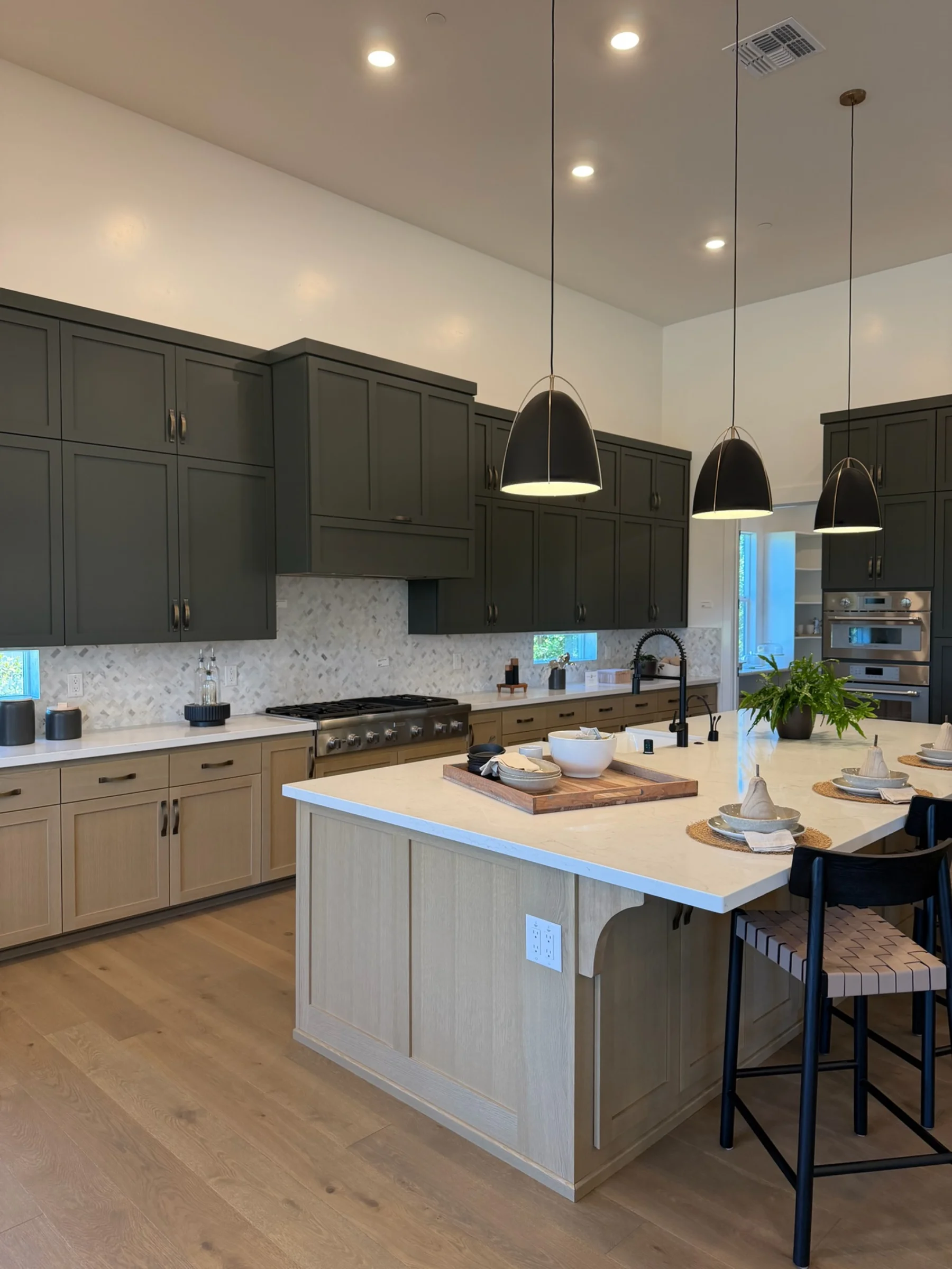 Kitchen island in submitted model-home imagery associated with Double S Ranch